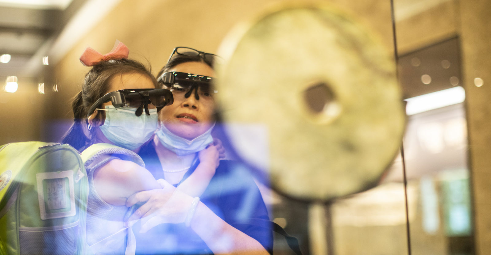 Caption: Visitors enjoying the AR+AI experience at the Archaeological Ruins in Liangzhu City with Rokid Glass 2 (Source: Rokid)