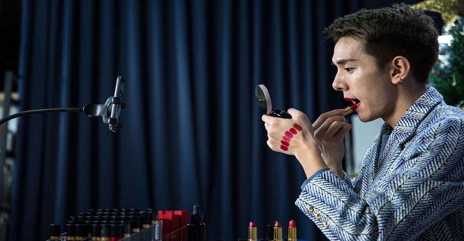 Li Jiaqi, who has 40 million fans on DouYin, applies lipstick during a live-stream session. Chinese brands have adopted live streaming as a new major marketing channel to push sales during the pandemic. (Source: China Daily)